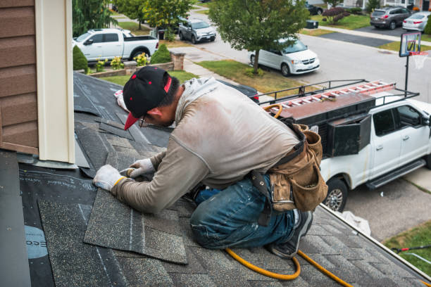 Professional Roofing technician working in Essington, PA